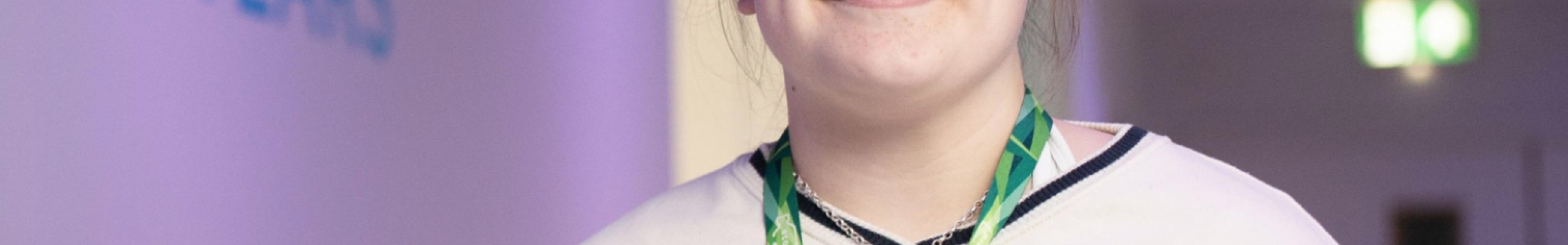 early years student standing in early years corridor