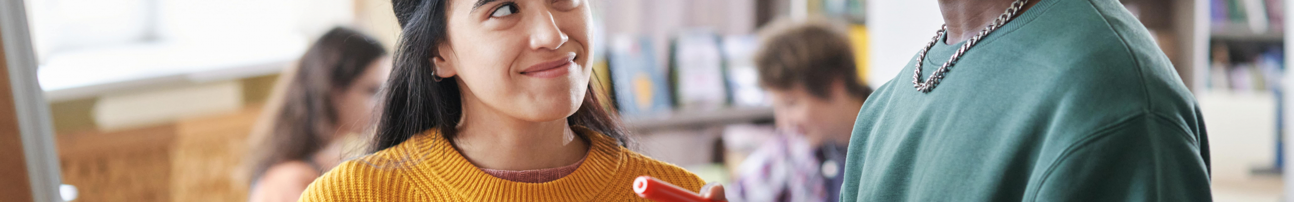 two ESOL students working together in classroom