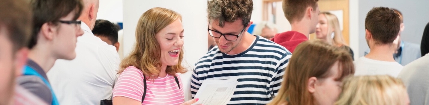 students smiling about results