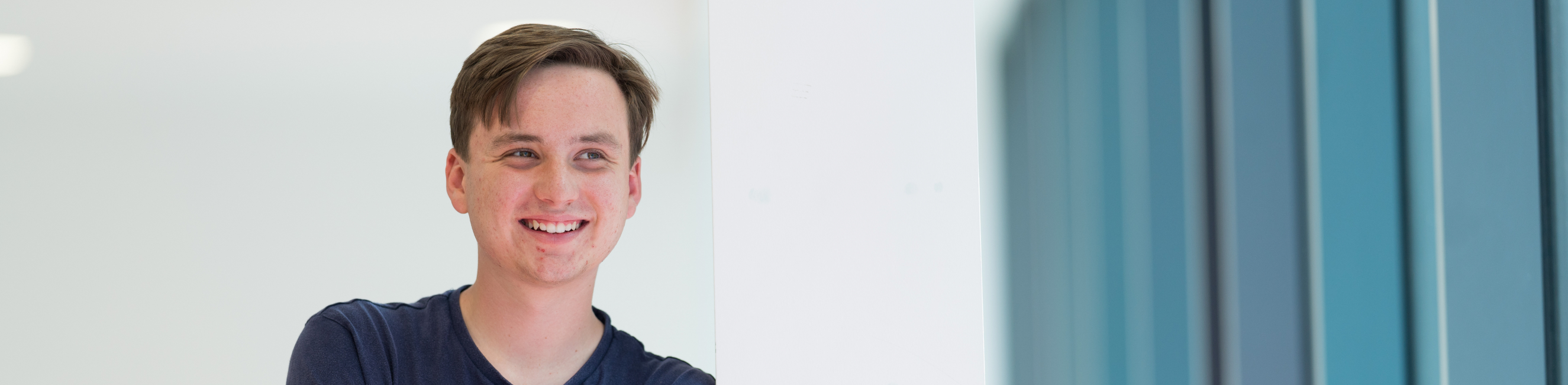 Student smiling at camera