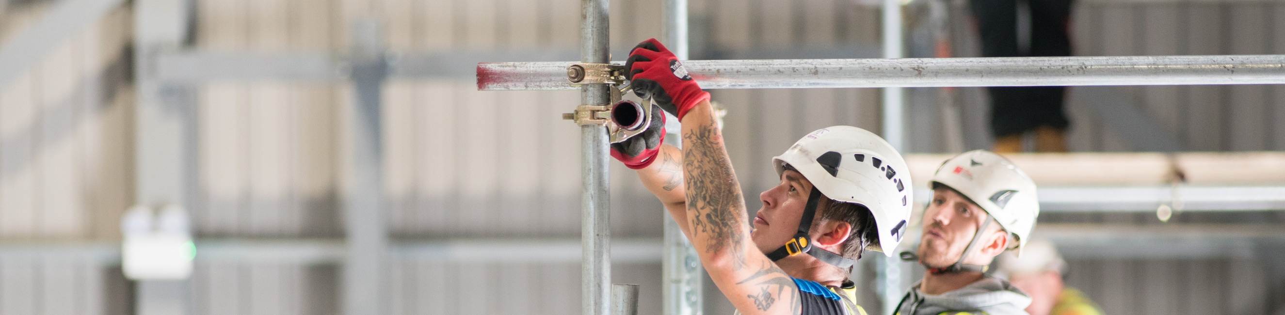 Scaffolding apprentice builds scaffold