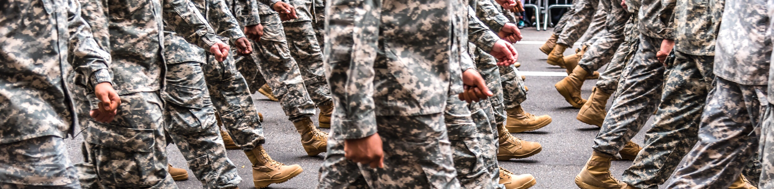 People in the army marching