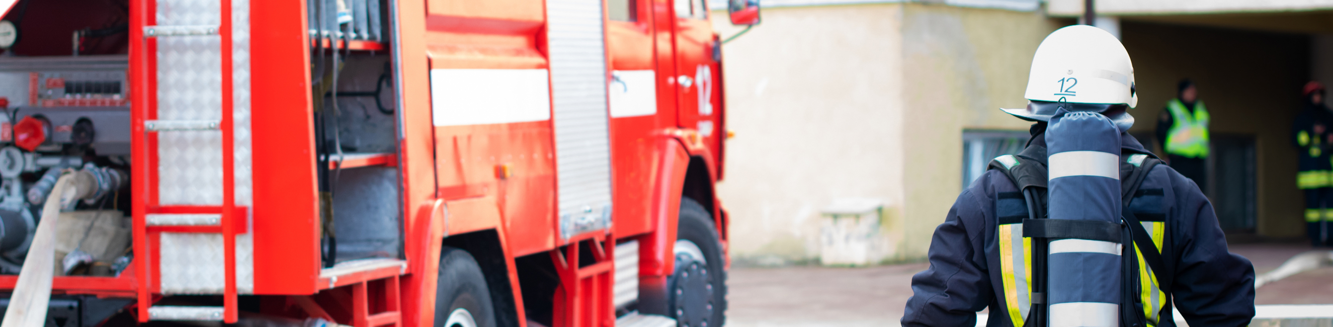 Firefighter with firetruck