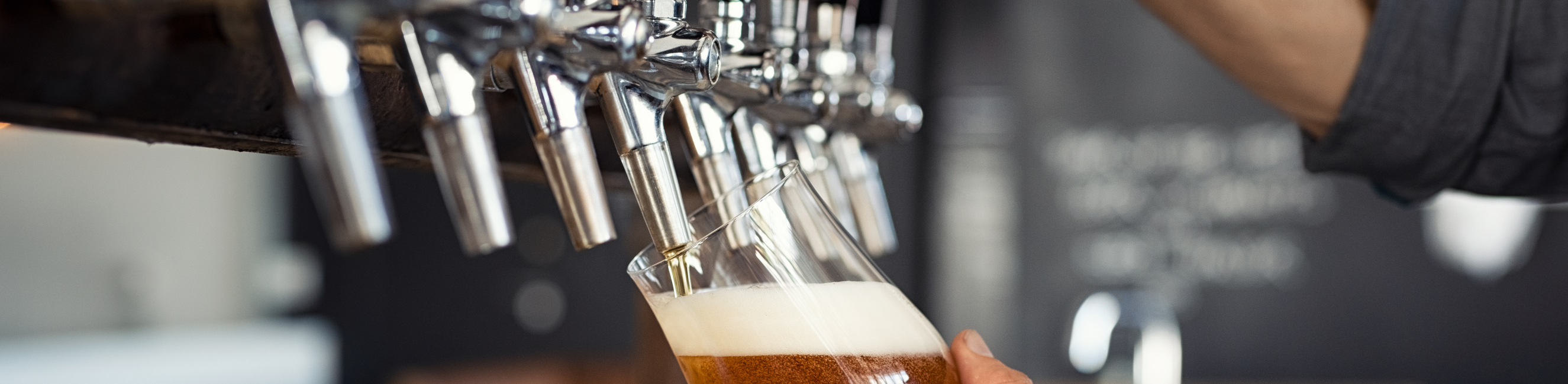 Pouring beer into glass