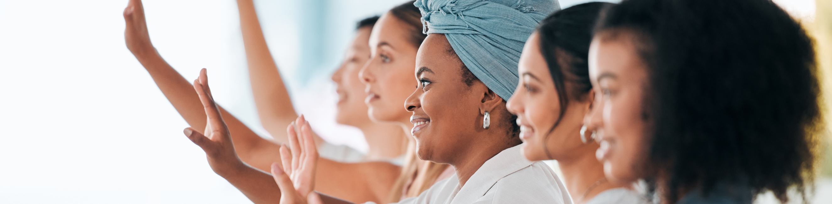 Five women attending a training session
