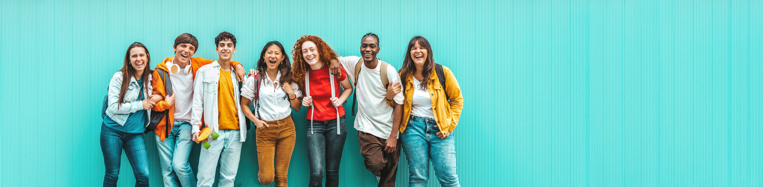 7 learners stood against the wall