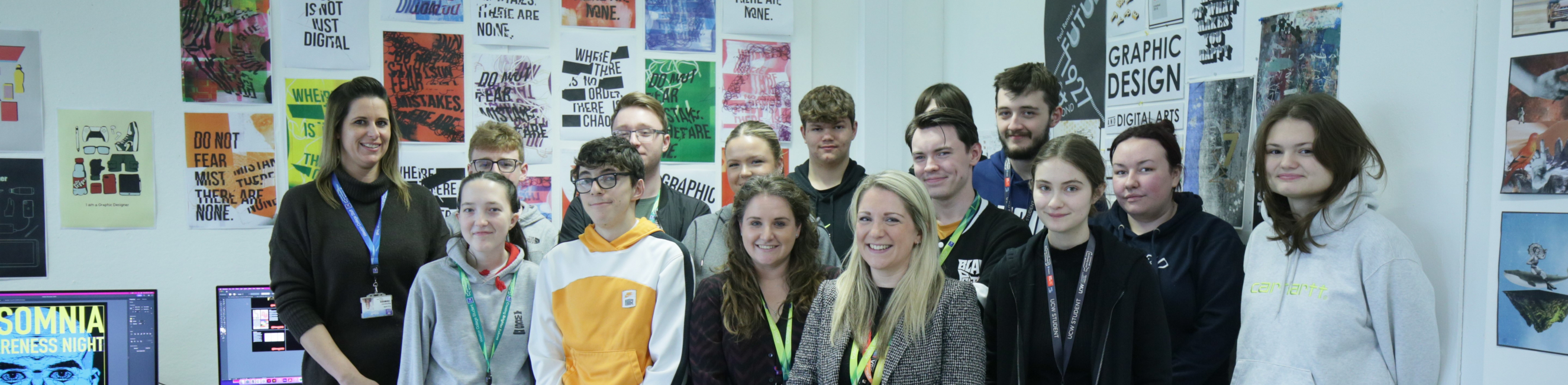 Group photograph of students who took part in the competition to design the logo