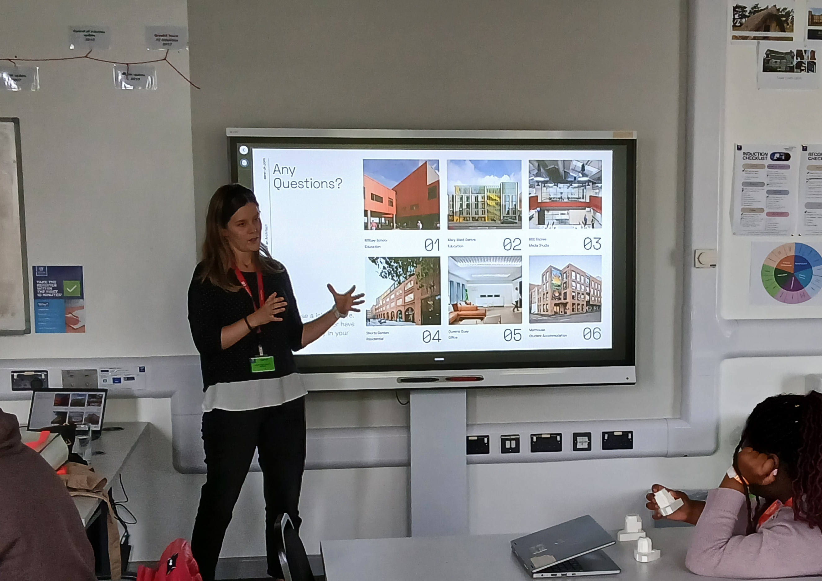 Irene discussing her journey and answering questions with students