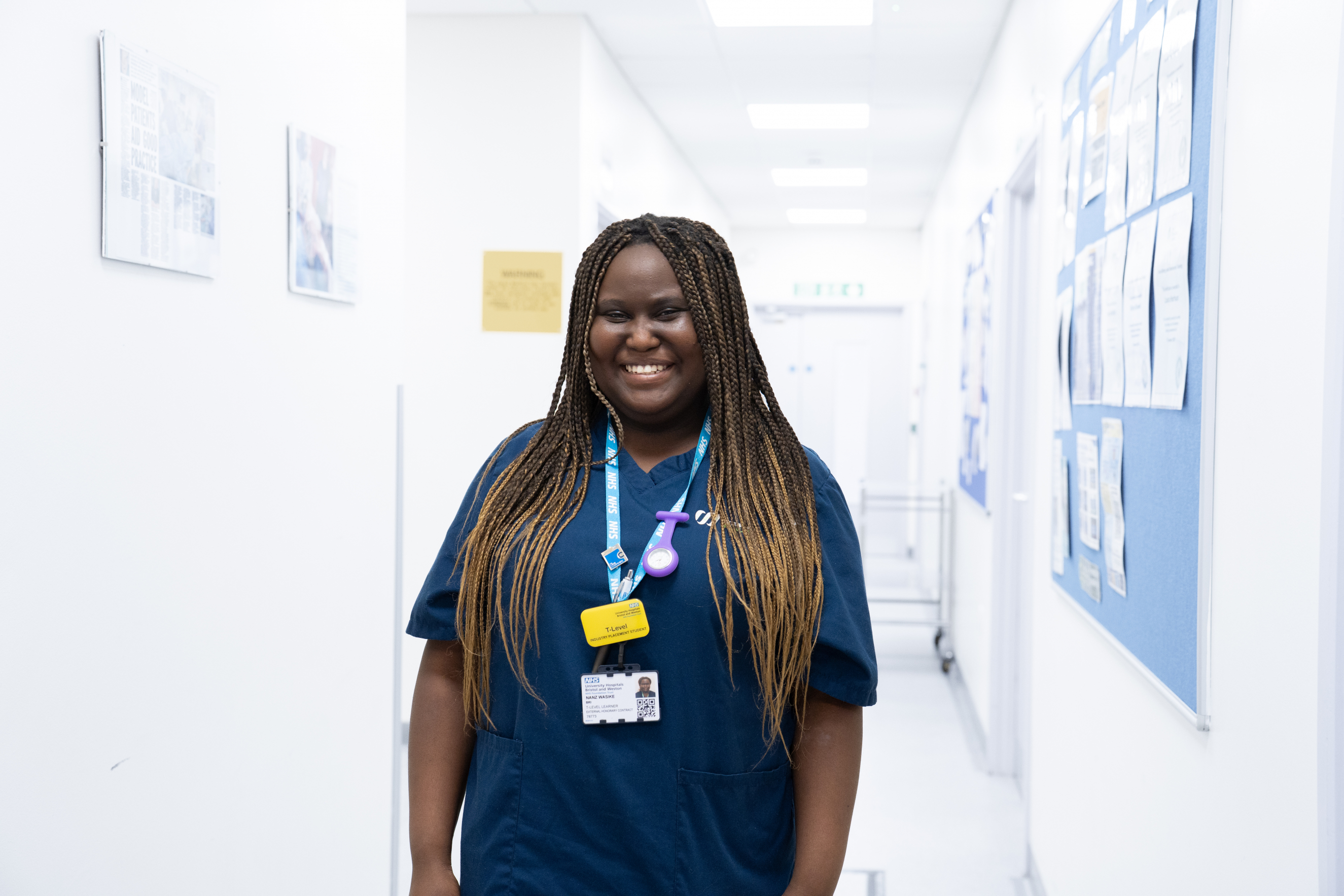 Nanz UHBW Learner Stood Smiling in Hospital Corridor