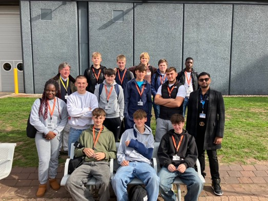 Group of students standing outside the NEC building