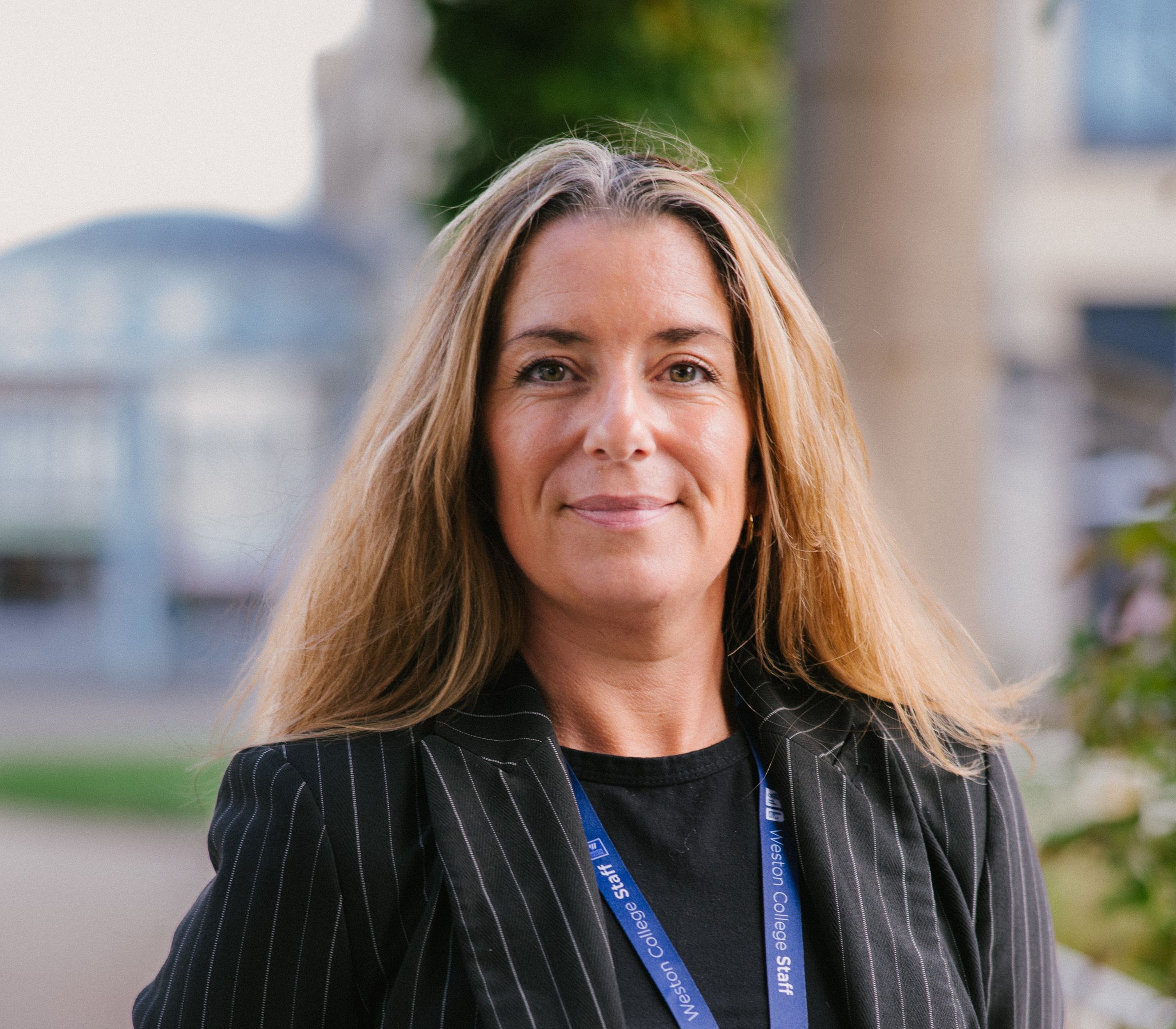 Helen Arnold-Richardson stood facing the camera and smiling