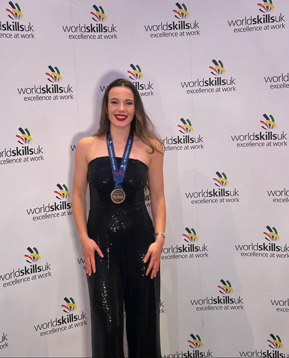 Maddie with her medal at WorldSkills