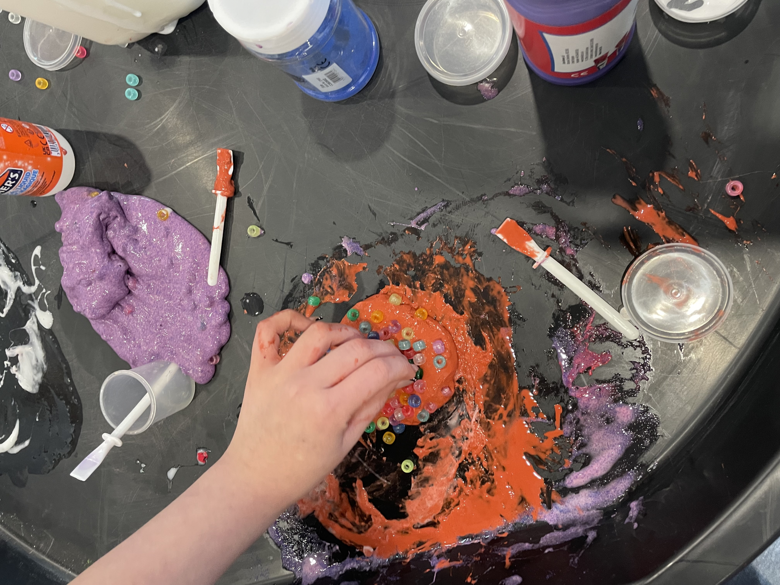 Students making slime in a workshop
