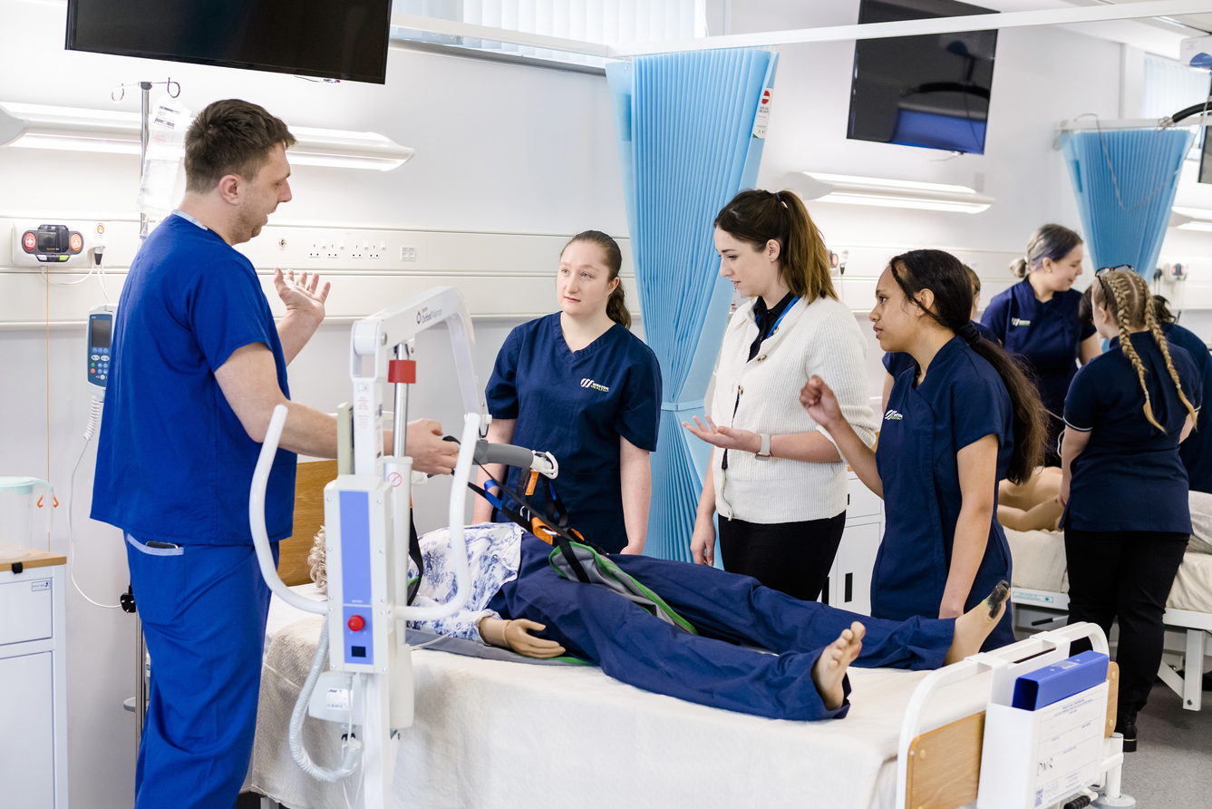 health students in the sim room