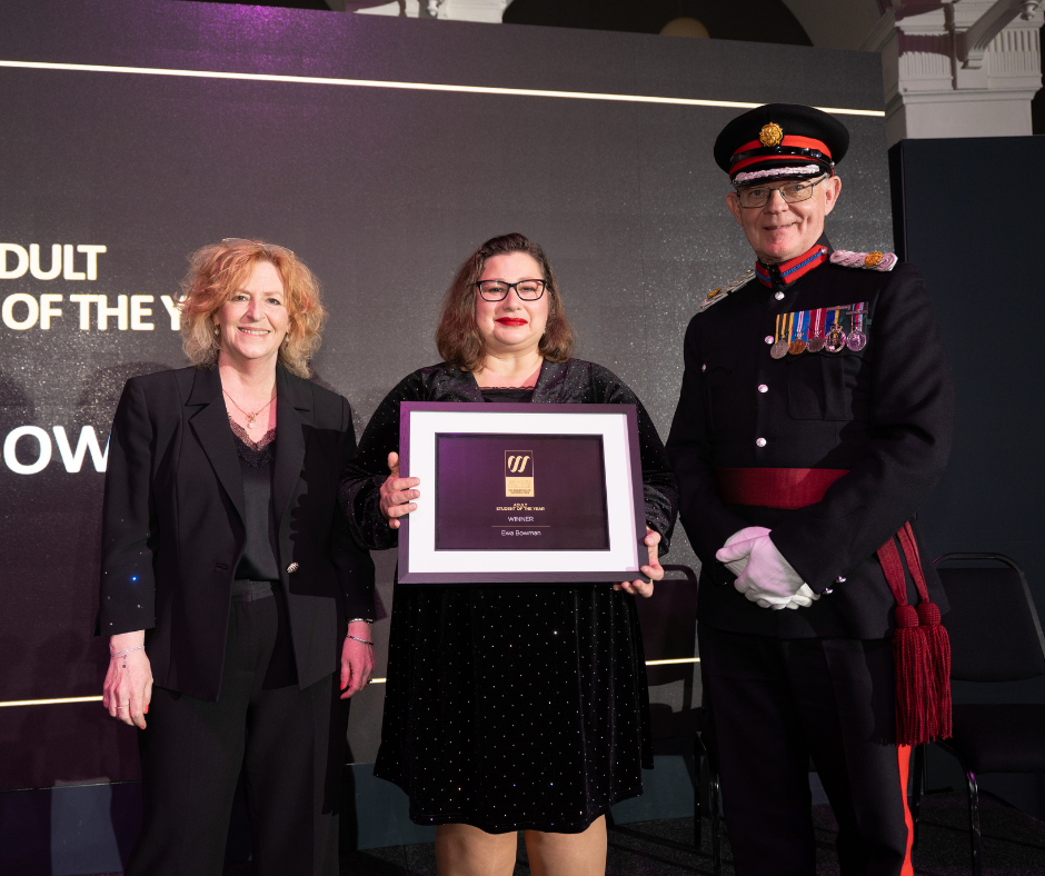 Ewa collecting her award