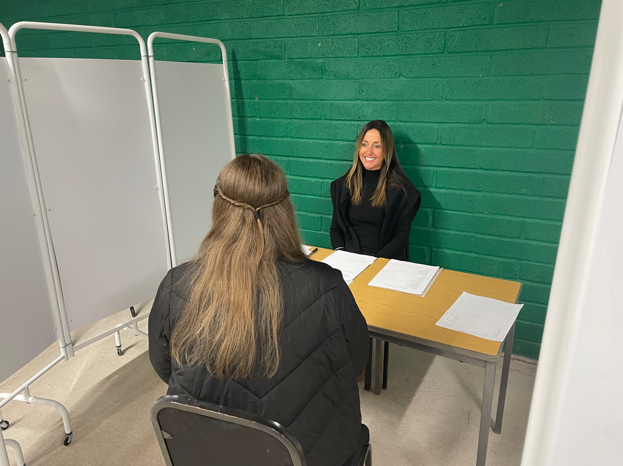 Dog Groomer, Liza, interviewing student