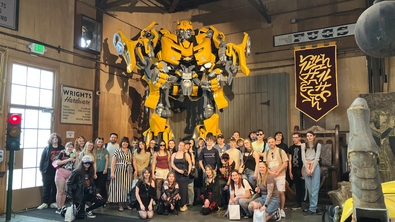 Students standing in front of the Bumblebee transformer