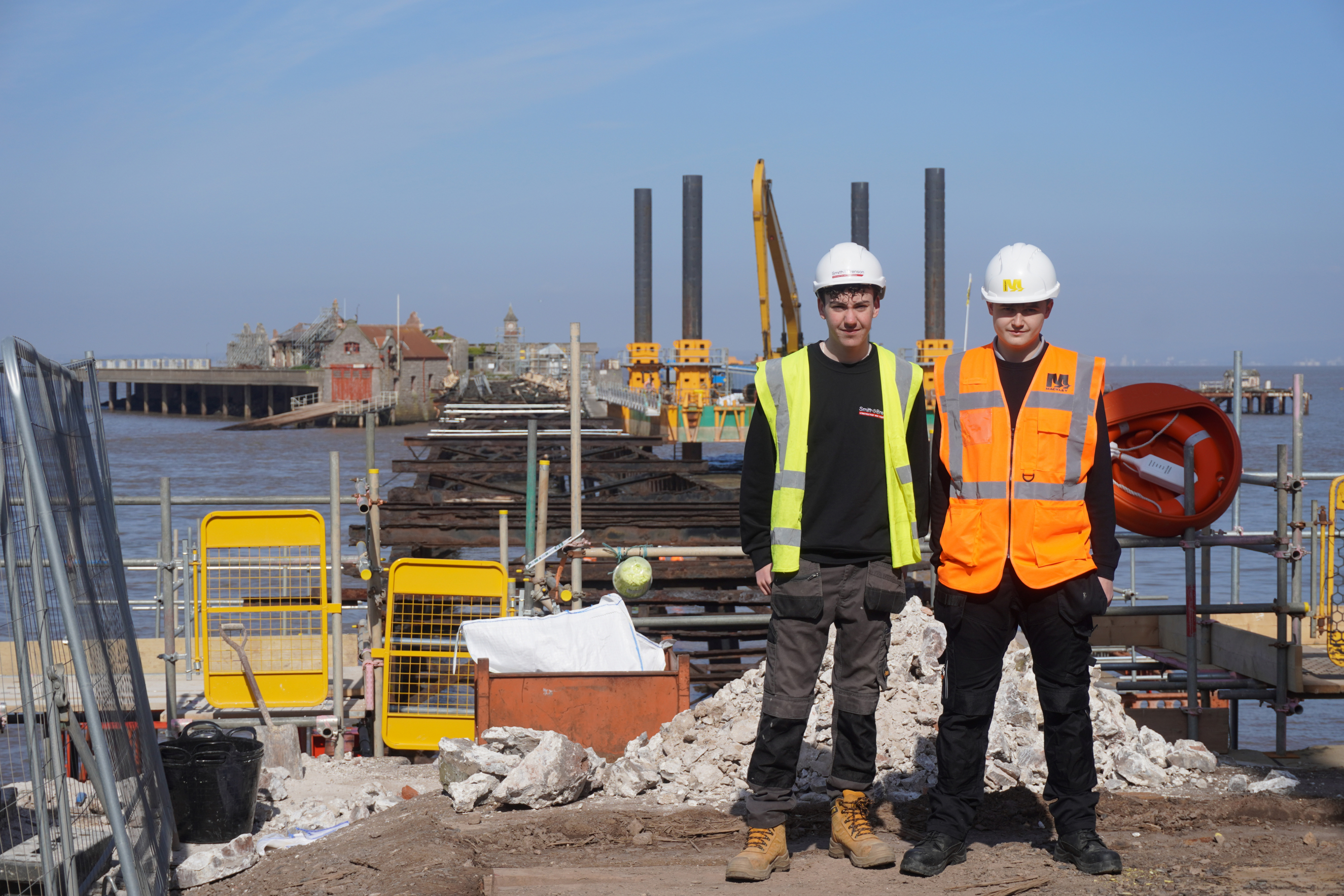 Finton and Ashton stood in front of birnbeck pier