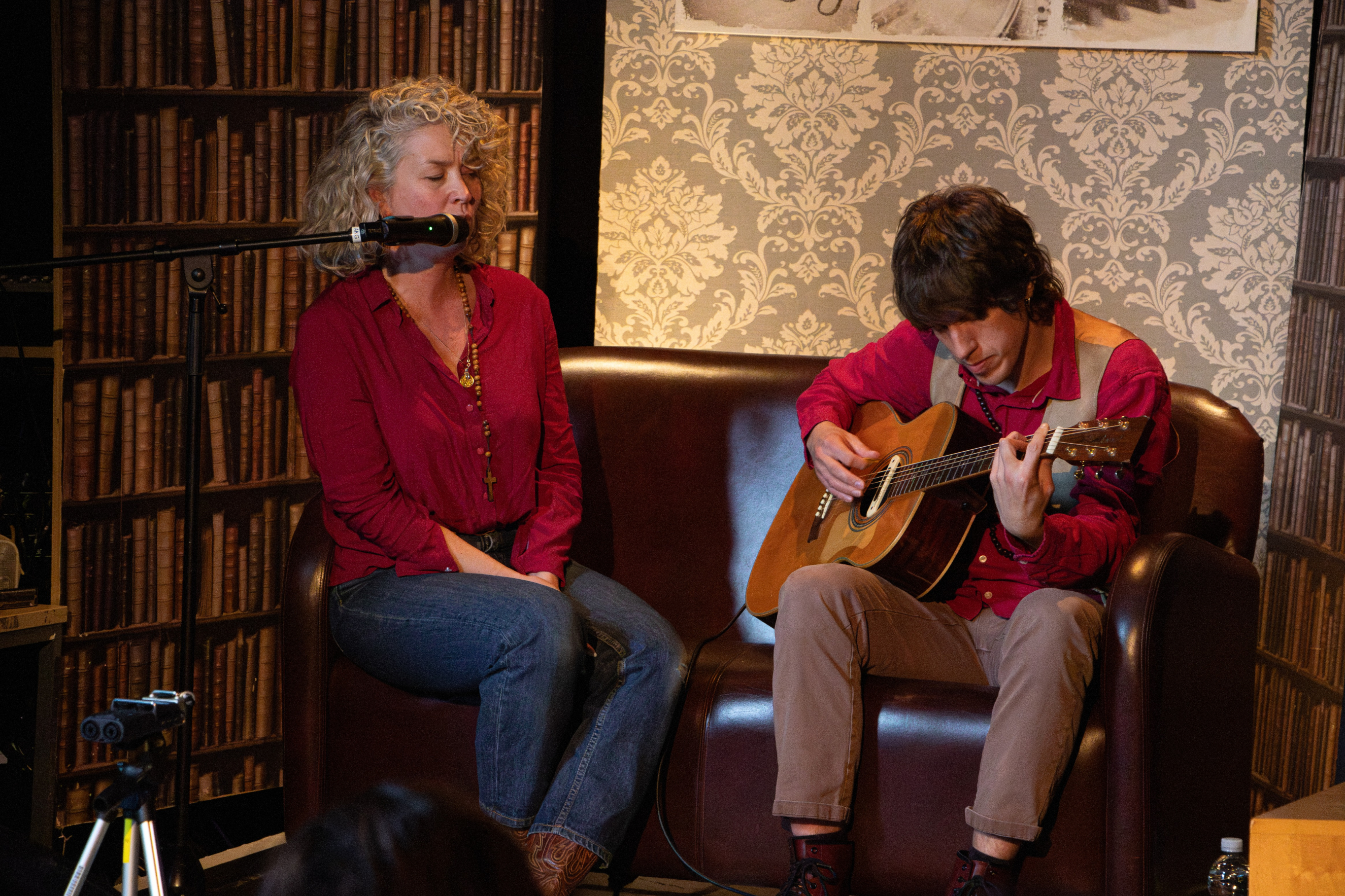 Beth and Tom singing to the group