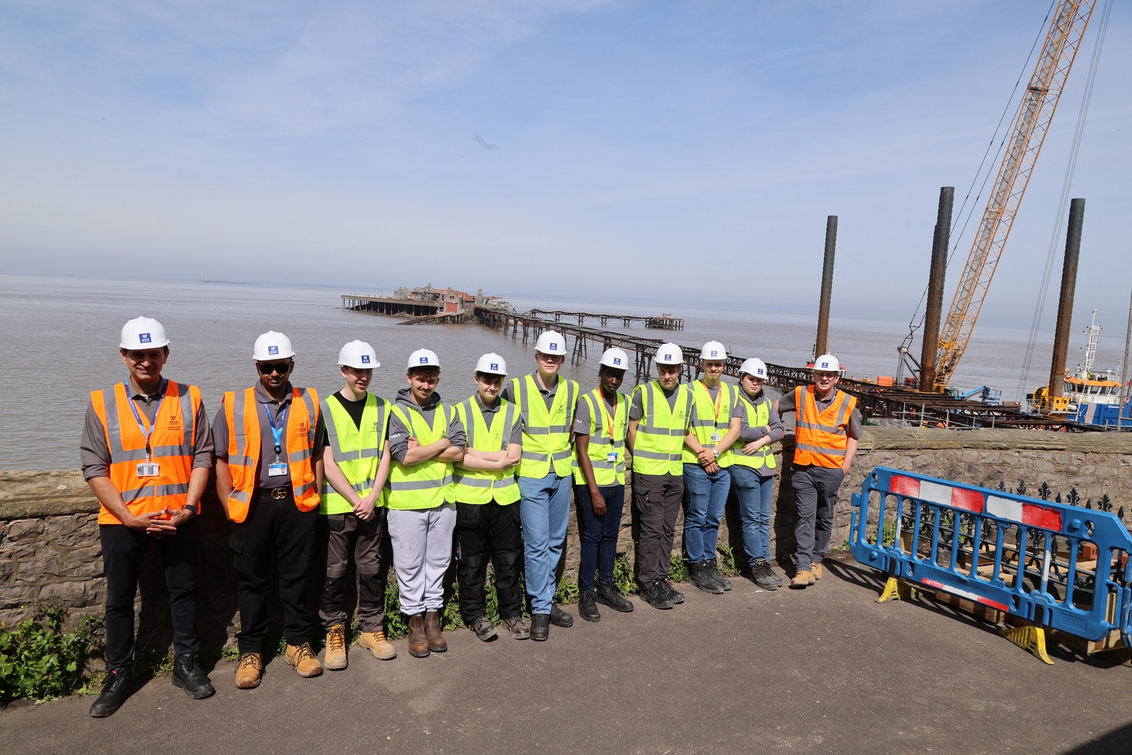 Students Stood Infront of Pier and Jack-Up Barge
