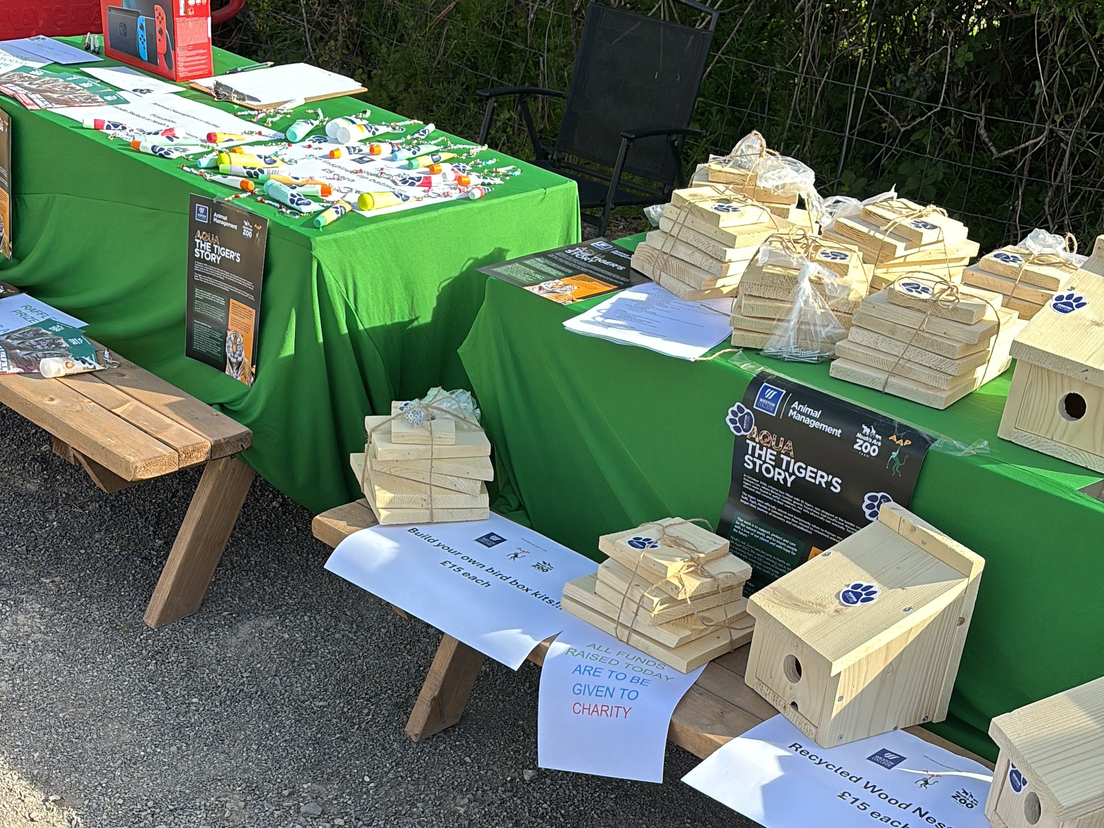 students selling handmade birdhouses at craft fair