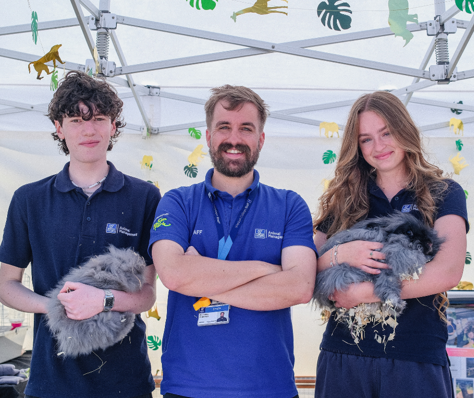 Animal Management learners with lecturer and rabbits