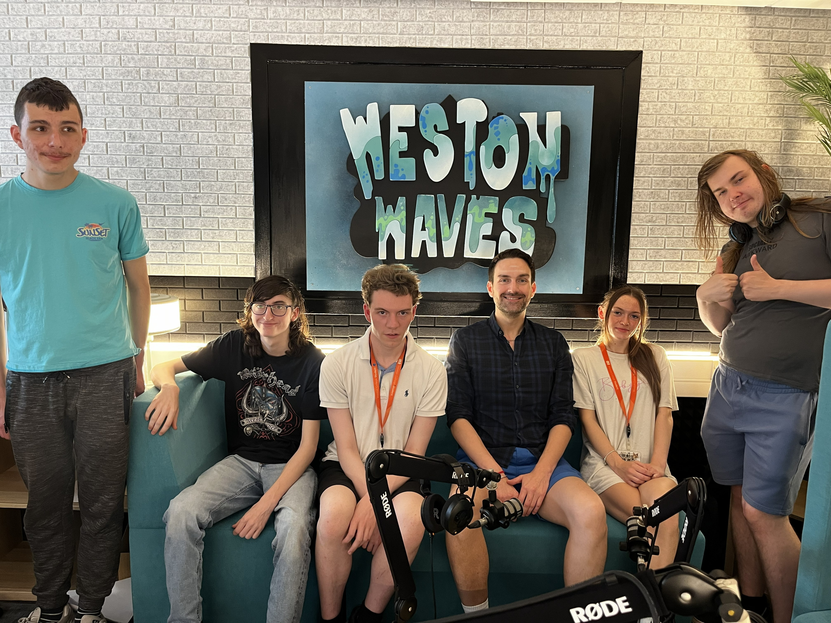 A picture of MP Dan Aldridge and five sixth form students sat in the podcast studio.  
