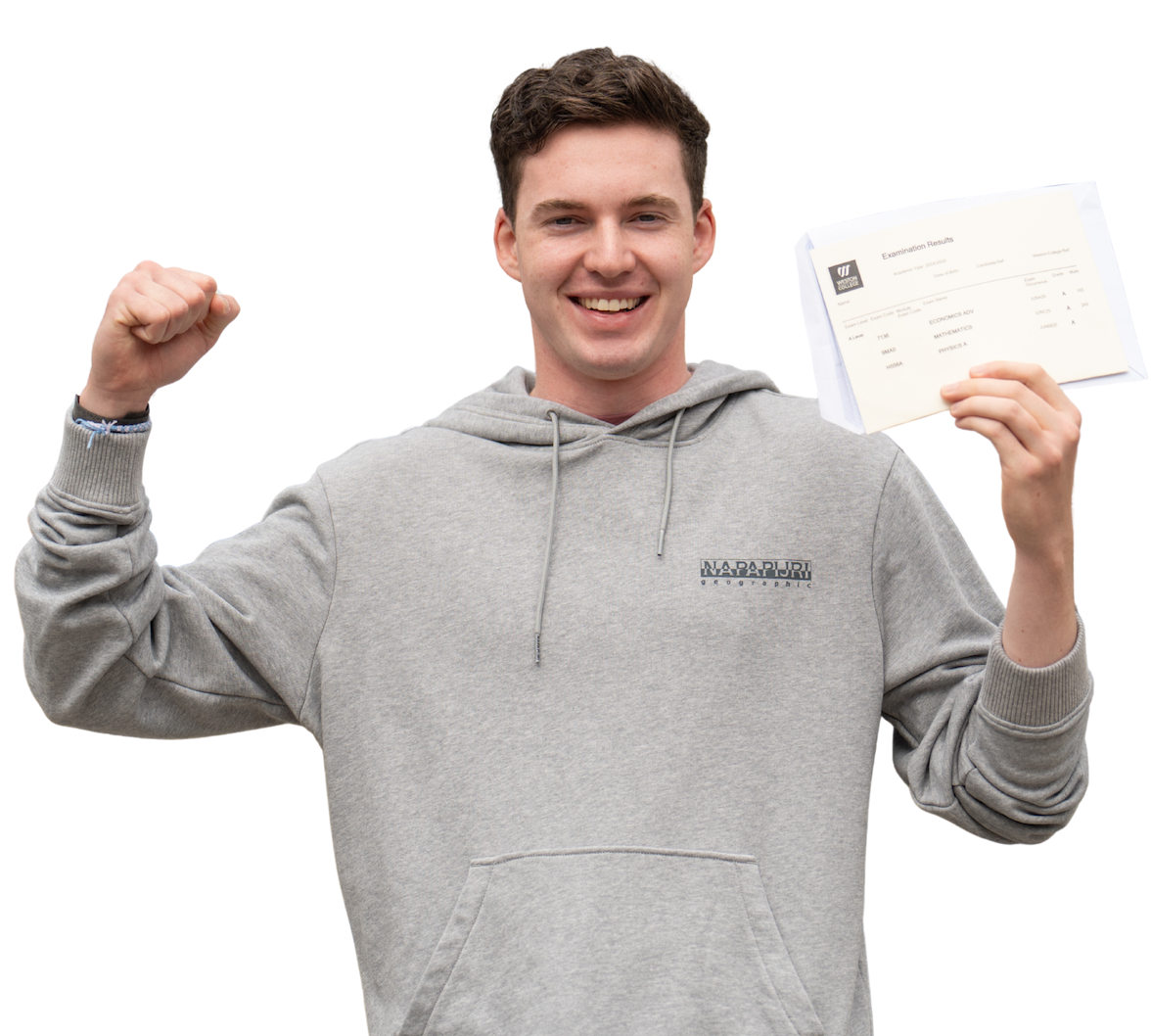 boy in grey hoodie with results in his hands