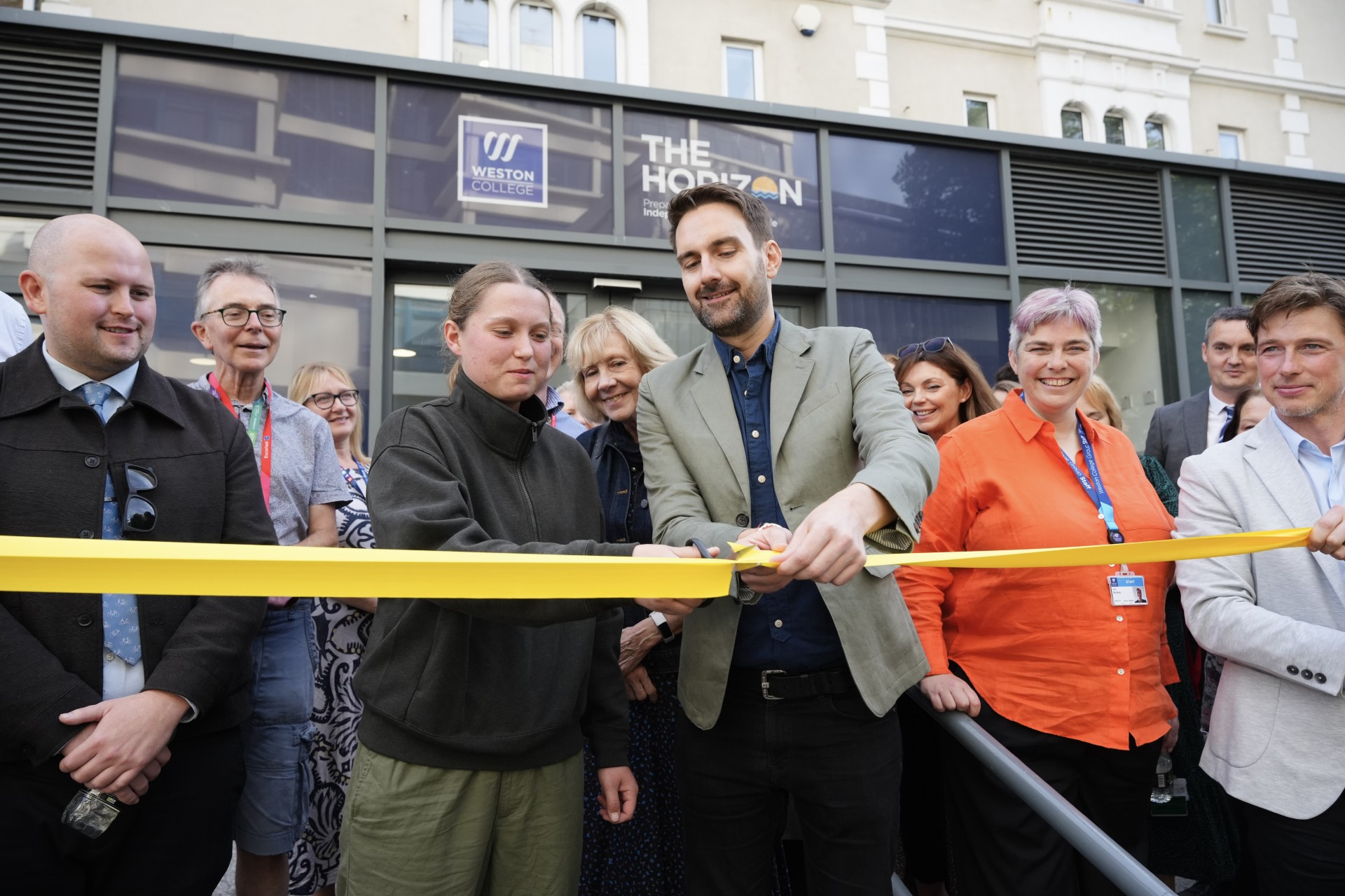 Dan Aldridge MP and Tilly cut the ribbon on the Horizon building 