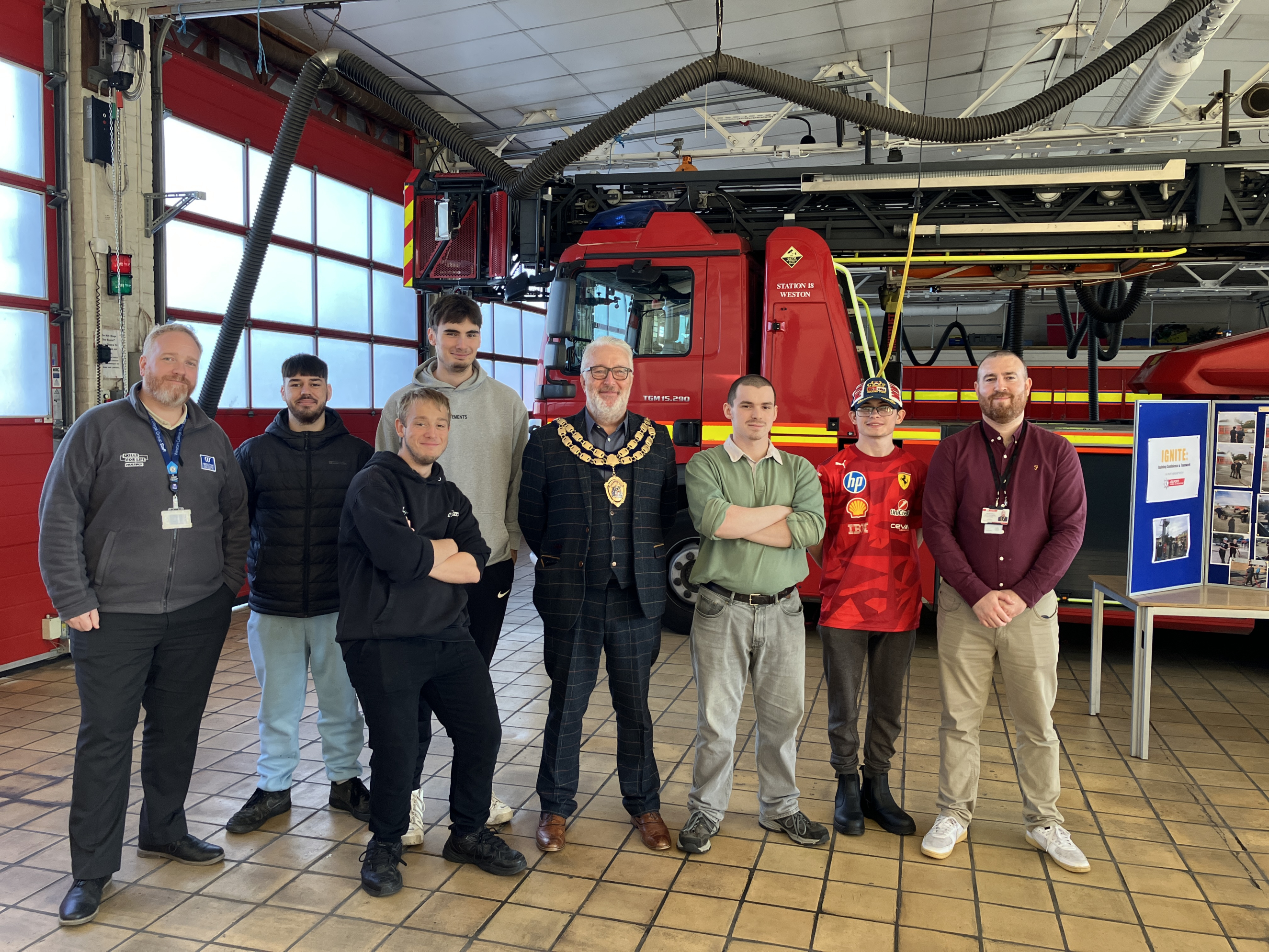 Group photo in front of fire truck
