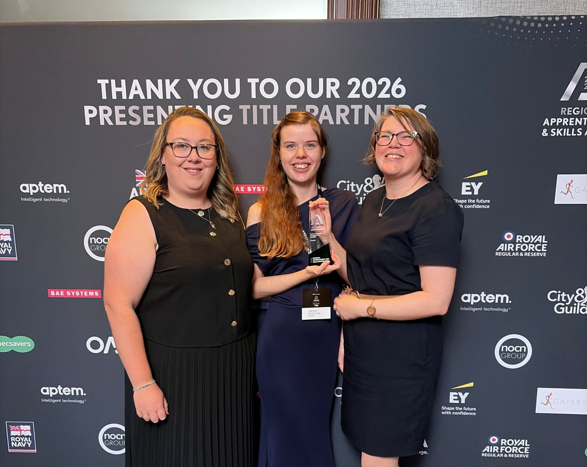 India collecting her award with Ffion and Sarah