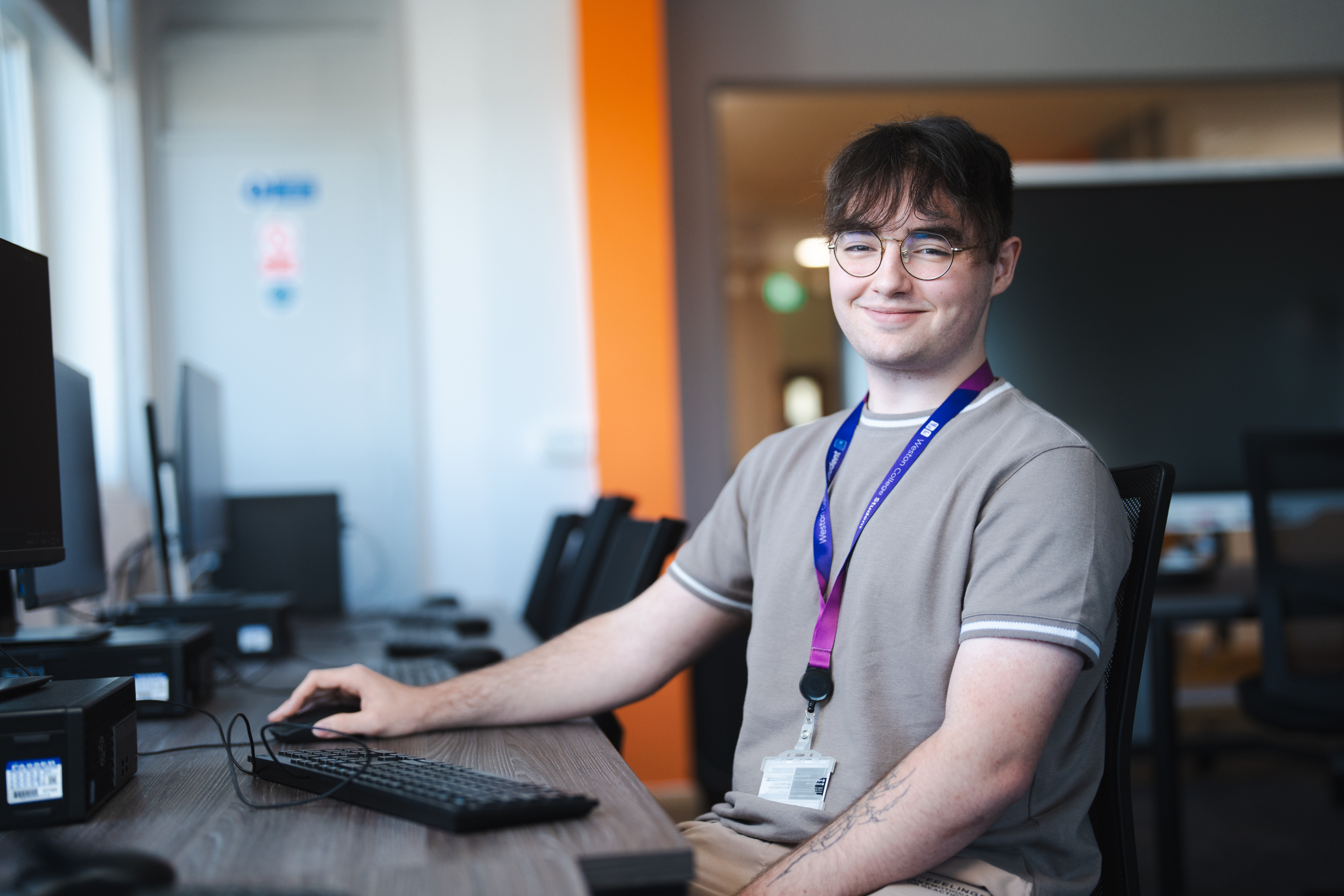 T Level student sat at computer
