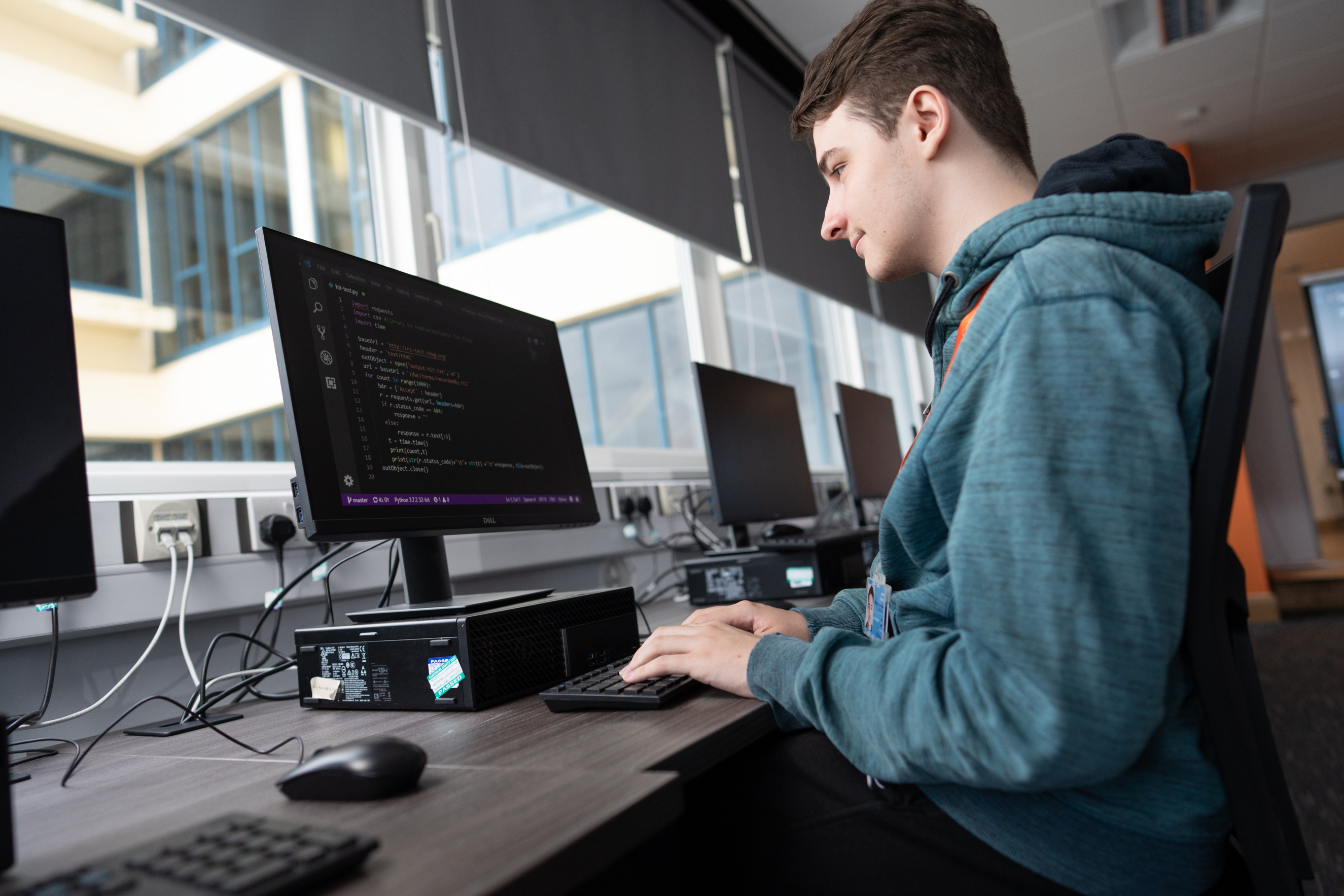 Digital student sat at computer typing