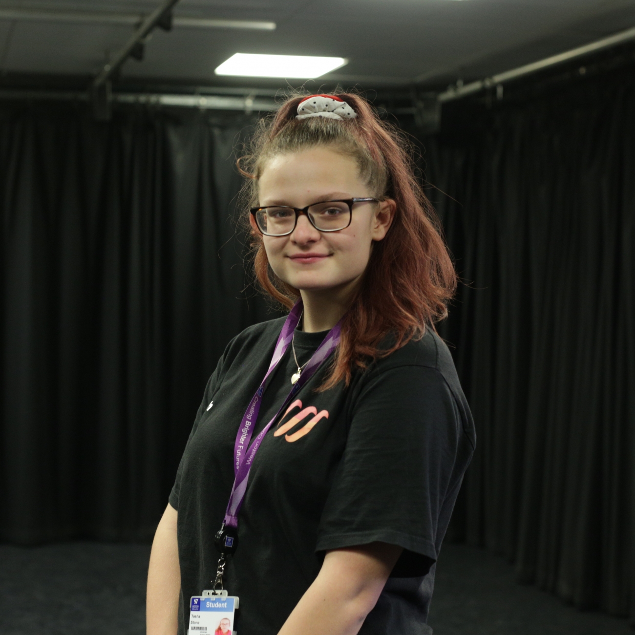 Tash from Level 3 Performing Arts standing in black tshirt in tap dance studio at weston college knightstone campus