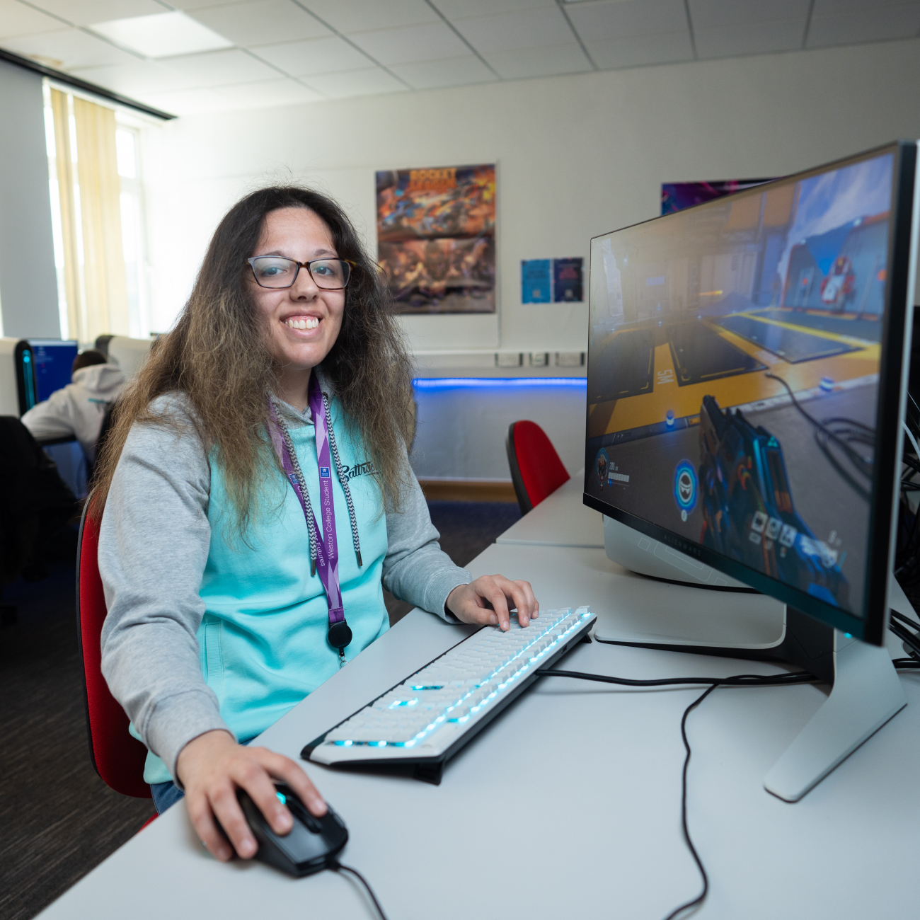 female student sat at computer gaming on esports video game course in weston super mare