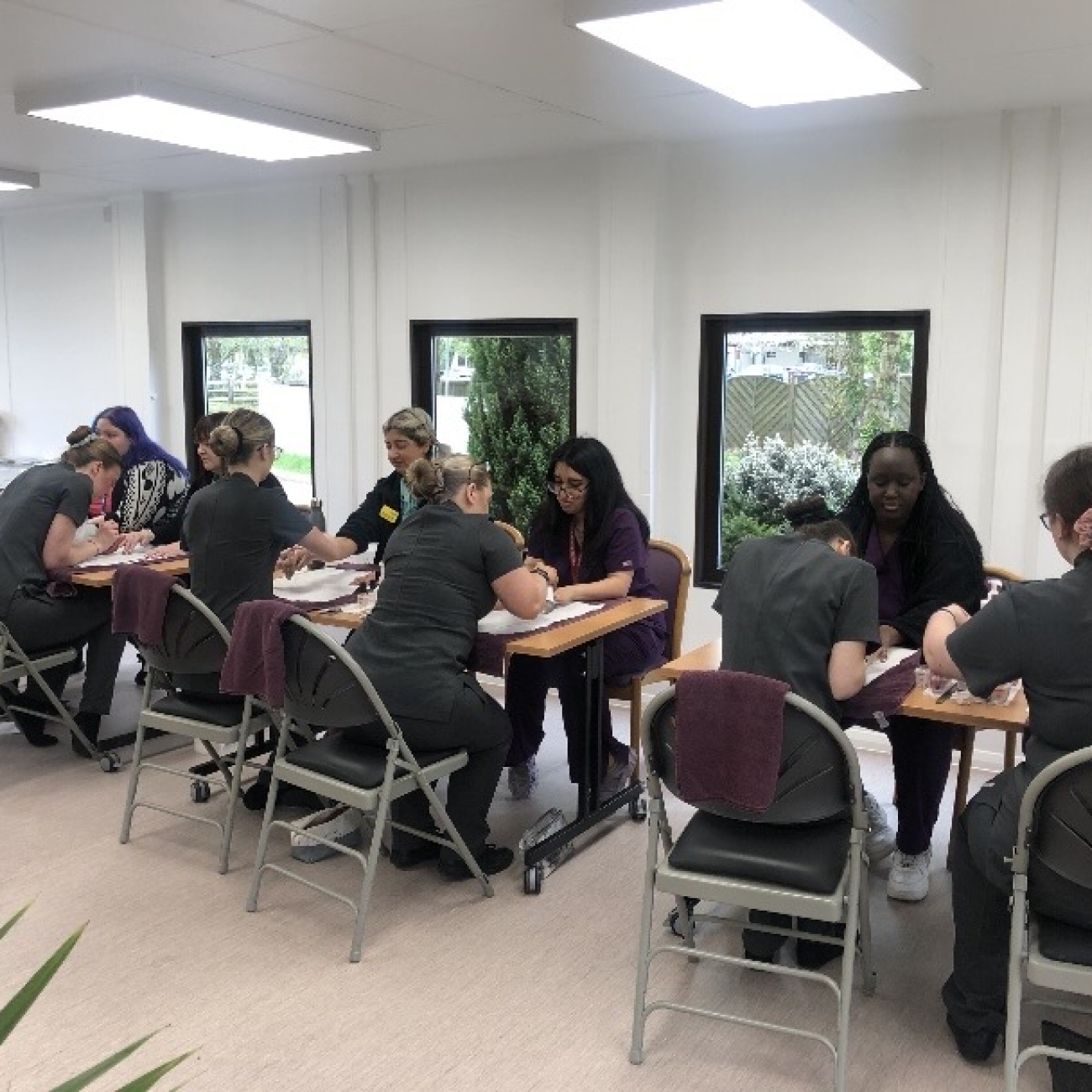 Learners pampering NHS staff in wellbeing centre