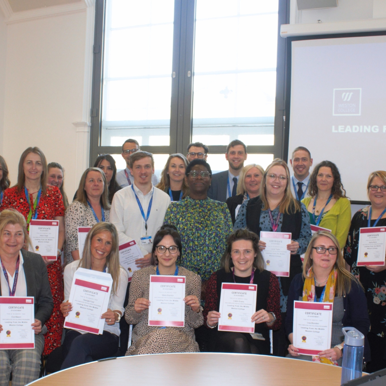Staff with Certificates from Management Course