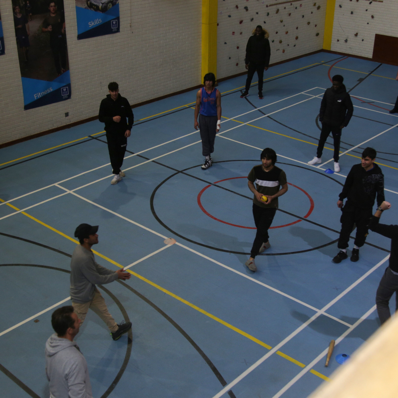 ESOL Learners, police and the fire brigade playing rounders.