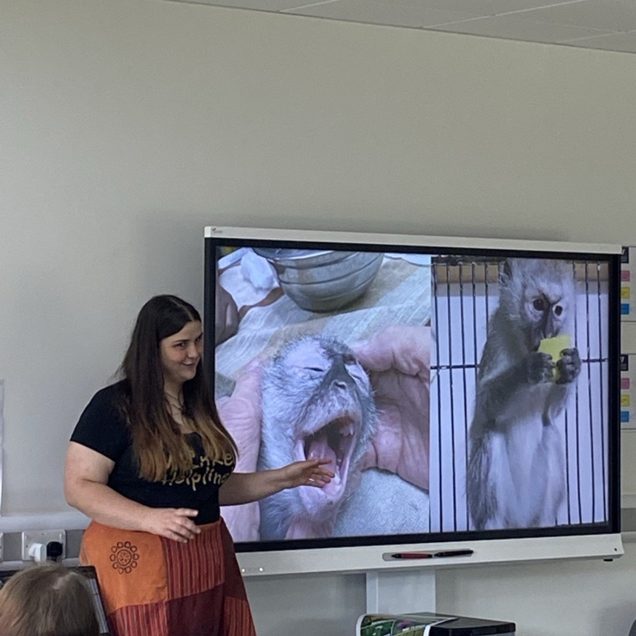 Ellie delivering guest talk about monkeys