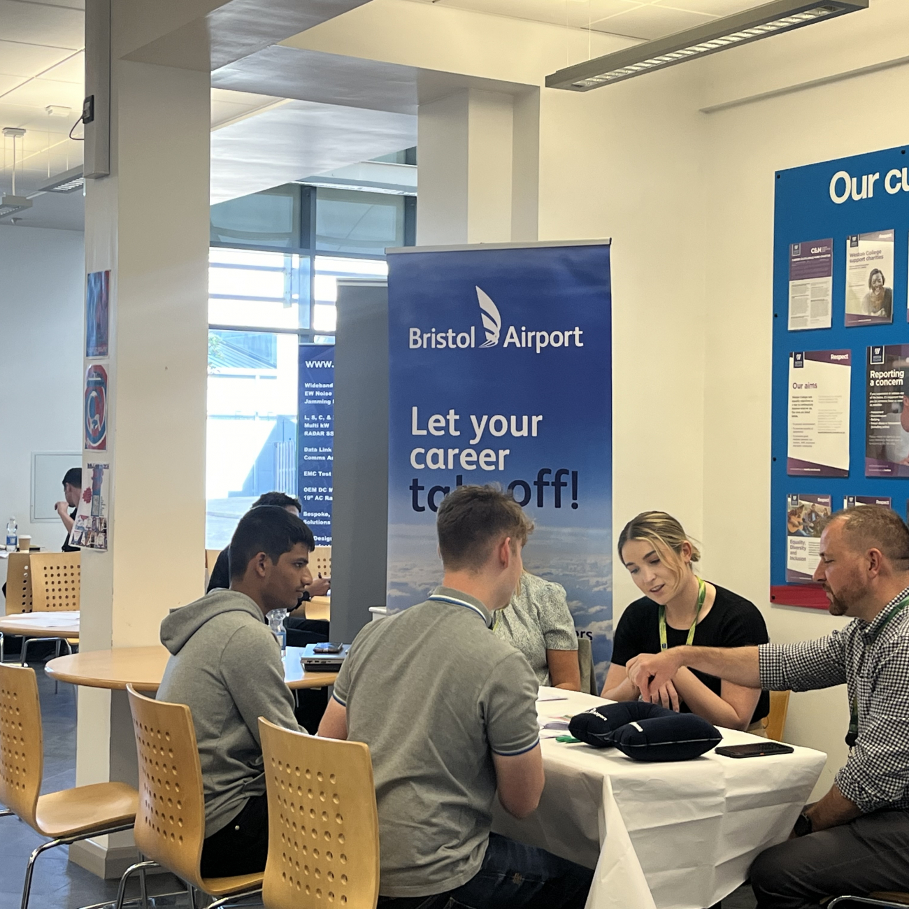 Bristol Airport recruiters in an informal interview with a learner
