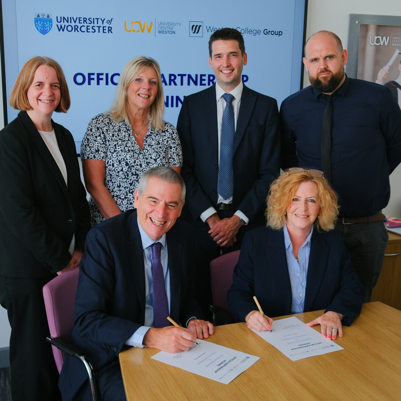 Senior leaders signing the agreement