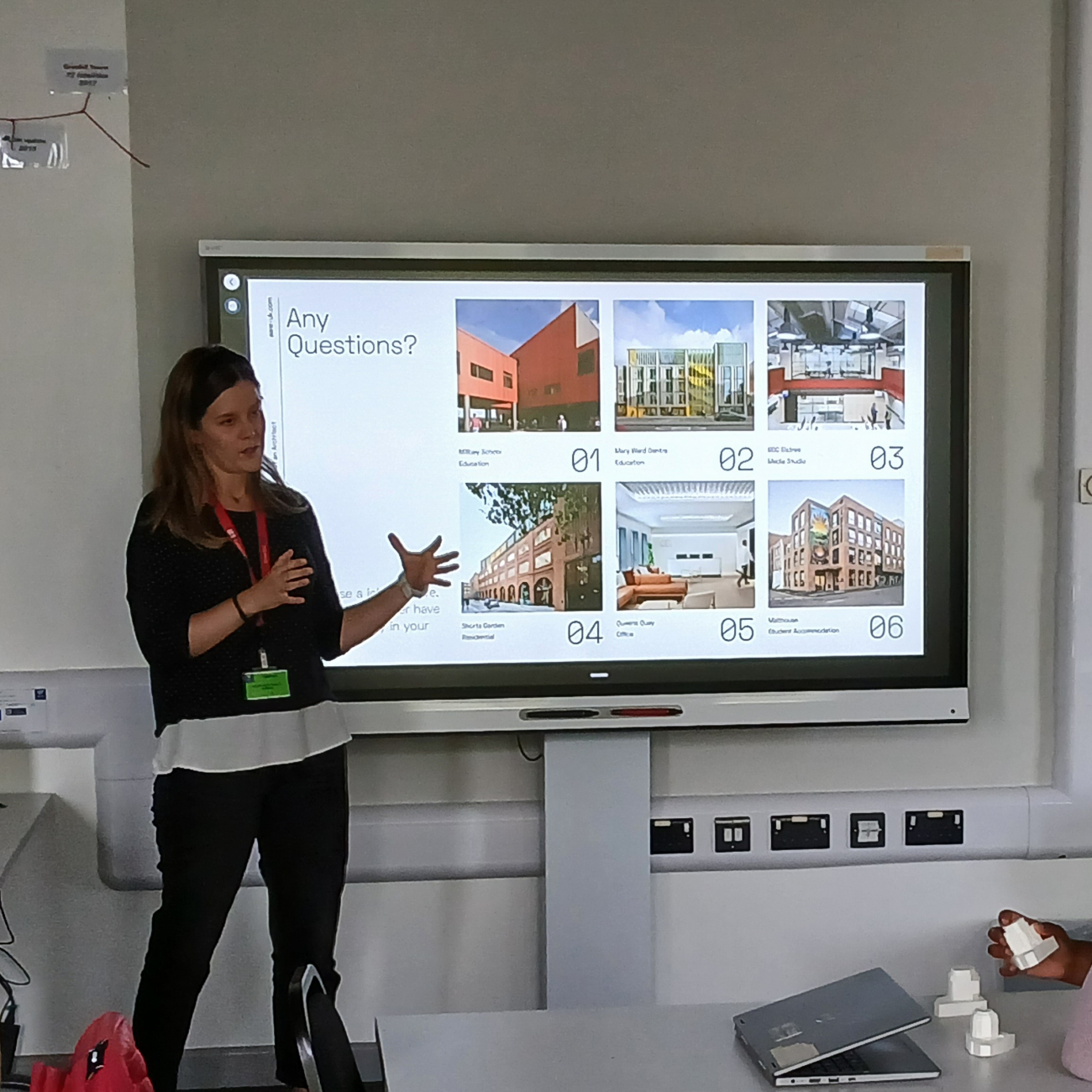 Irene discussing her journey and answering questions with students