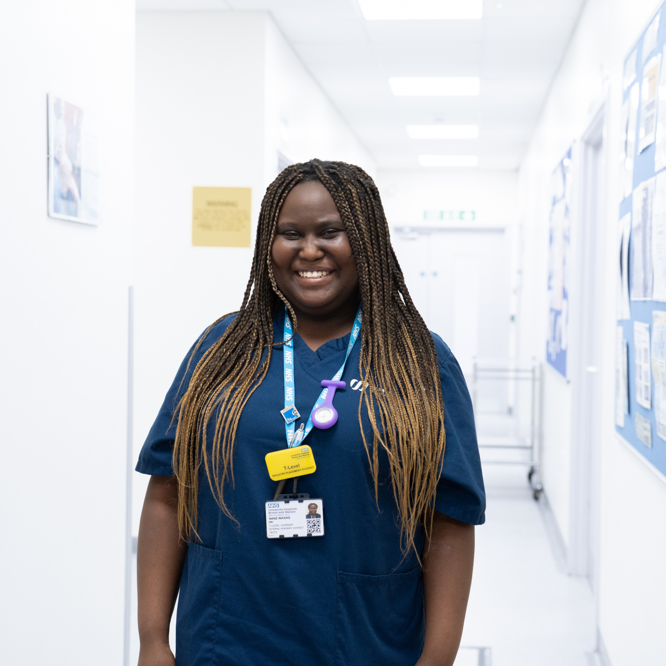 Nanz UHBW Learner Stood Smiling in Hospital Corridor