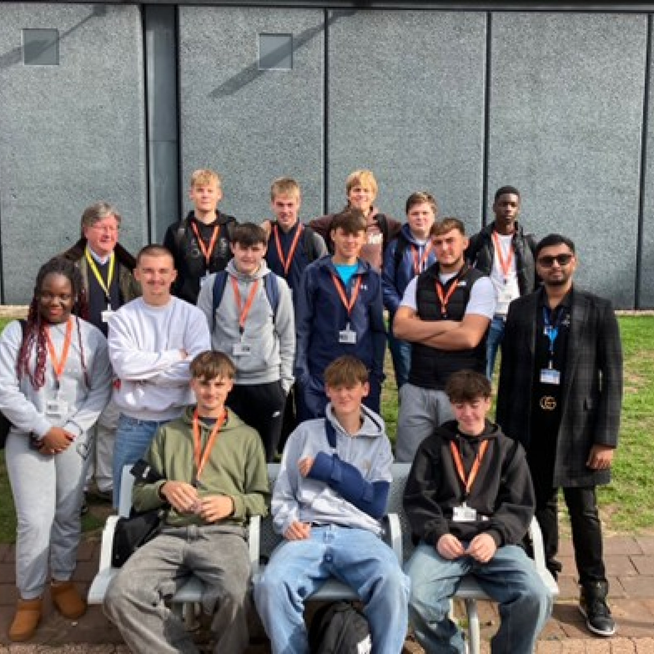 Group of students standing outside the NEC building