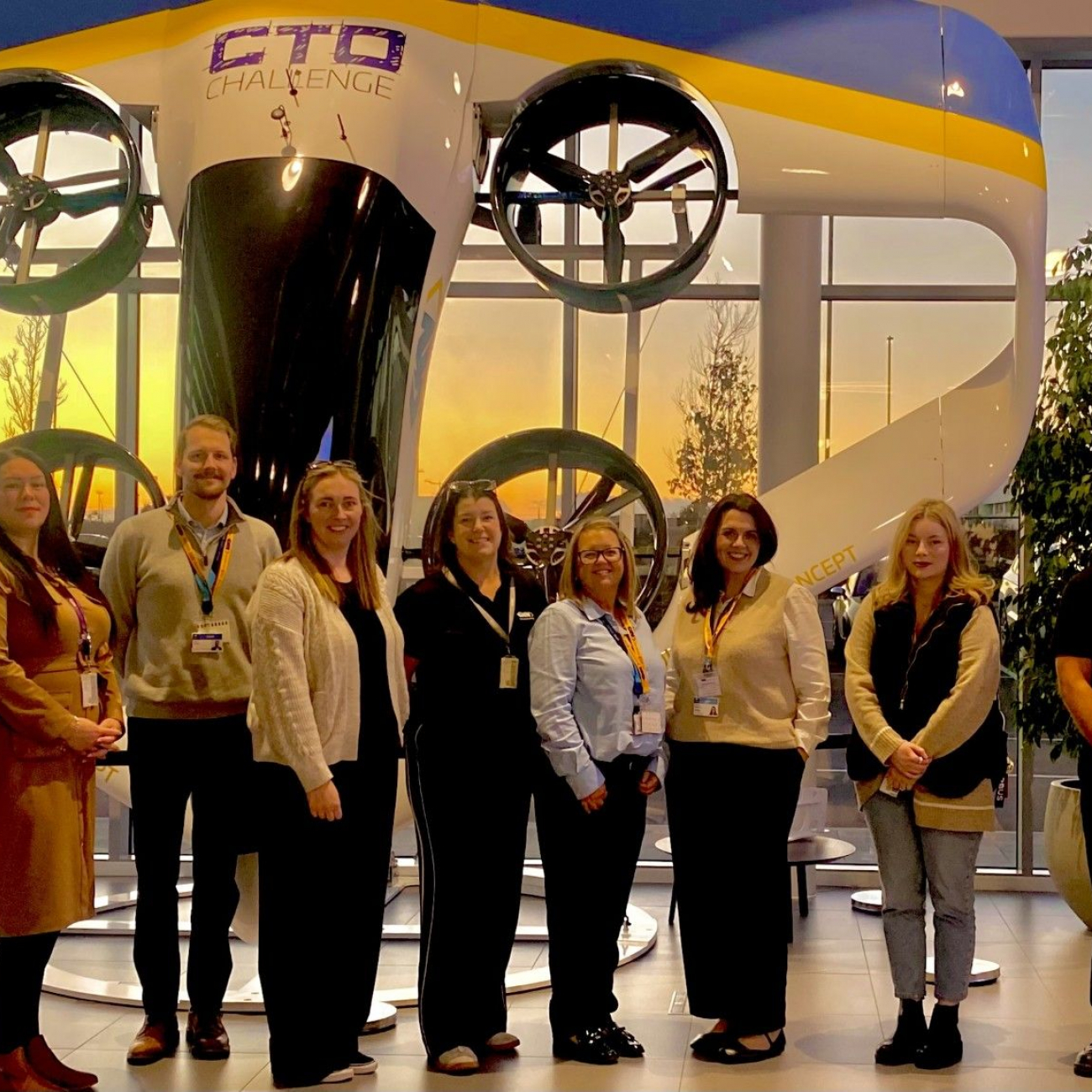 Staff at GKN Aerospace Stood in front of Sunrise