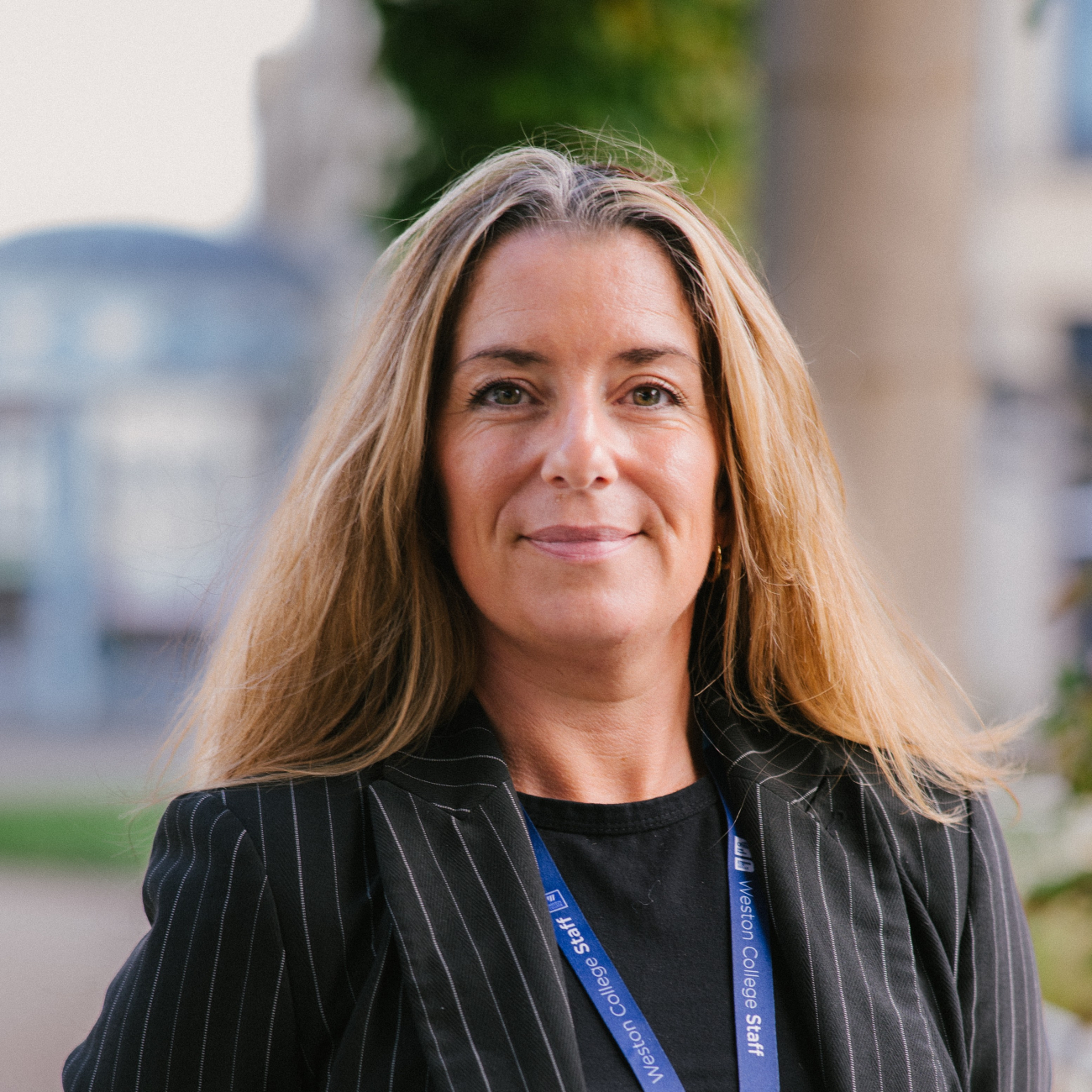 Helen Arnold-Richardson stood facing the camera and smiling