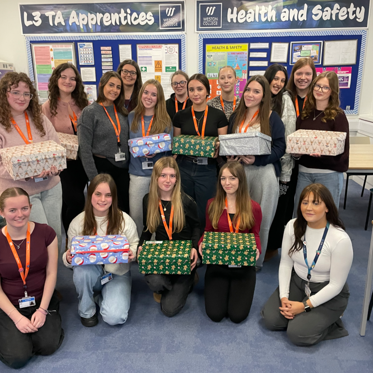 Early Years students holding their shoeboxes