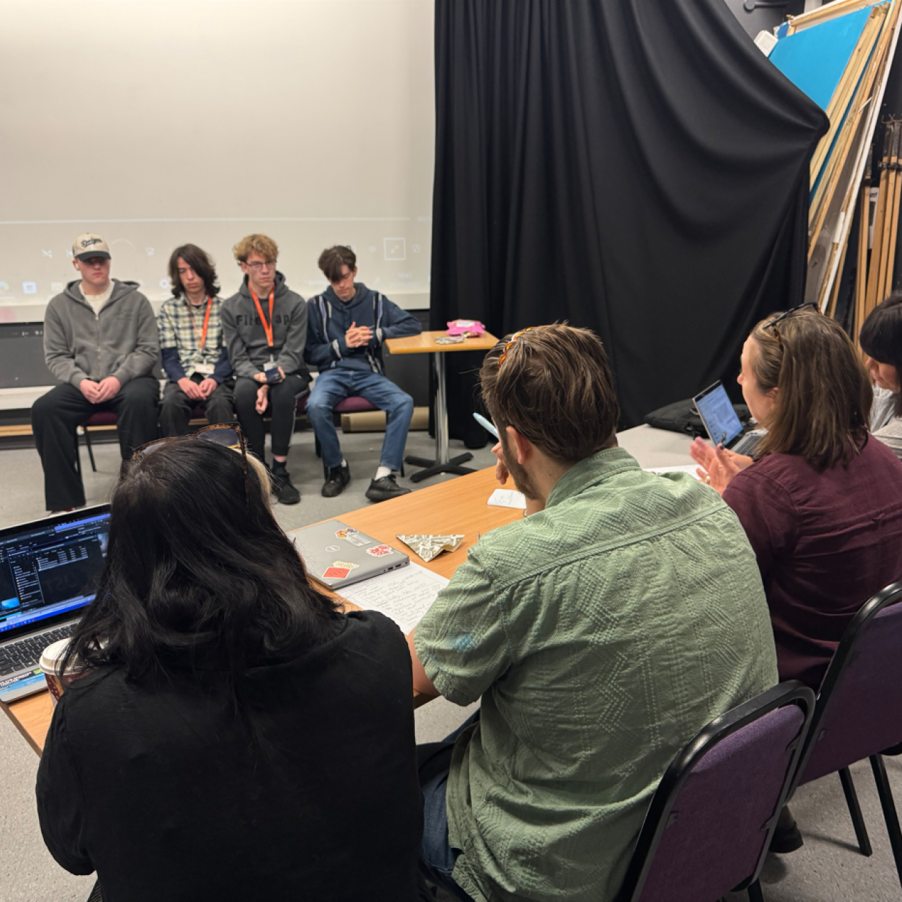 Media lecturers giving feedback to students