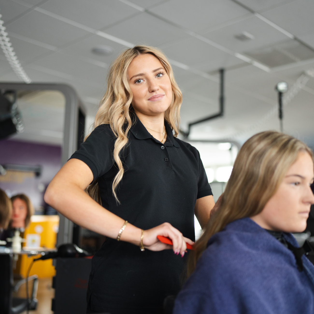 Hair and Beauty learner smiling at the camera