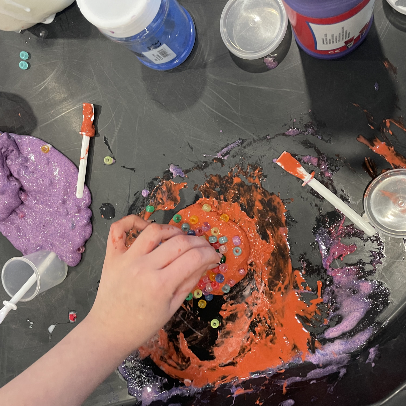 Students making slime in a workshop